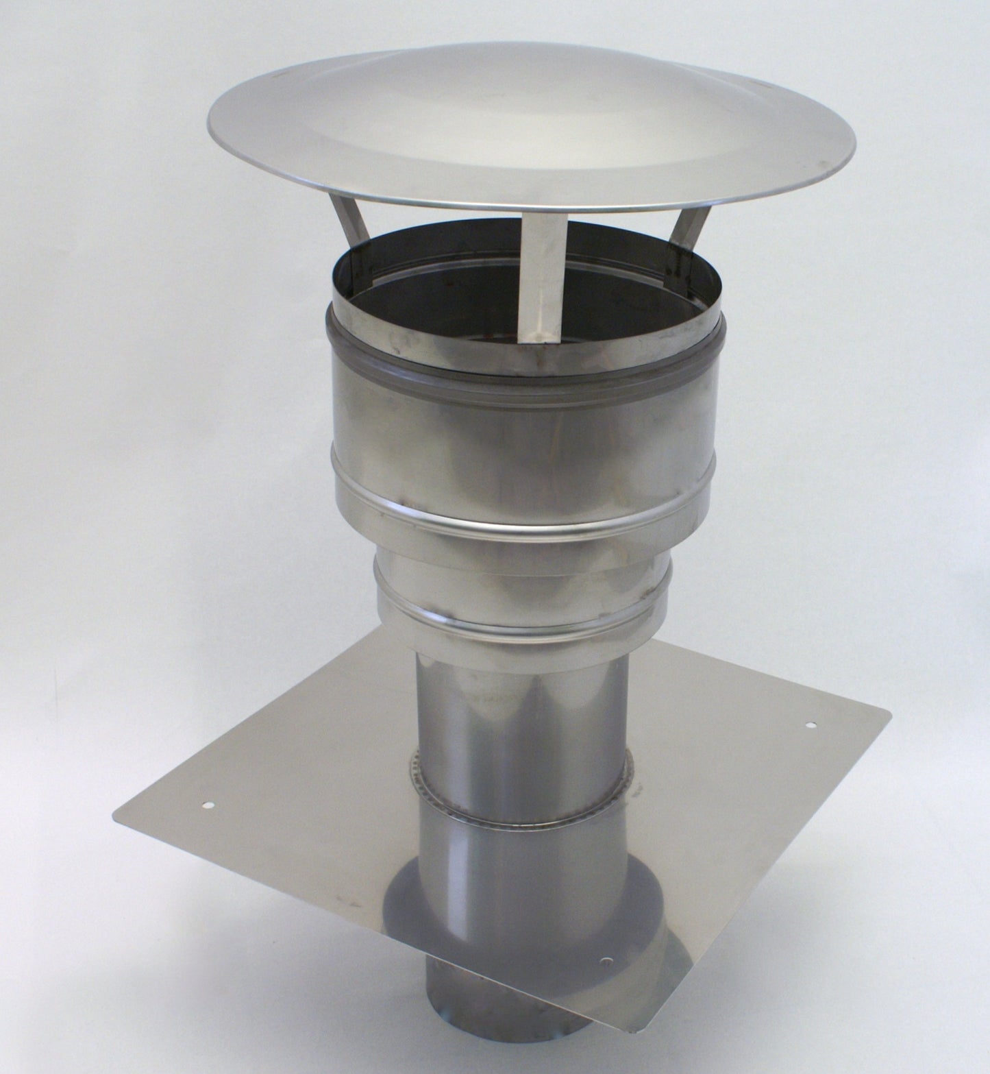 Chimney attachment with wind rings, chimney riser in various sizes